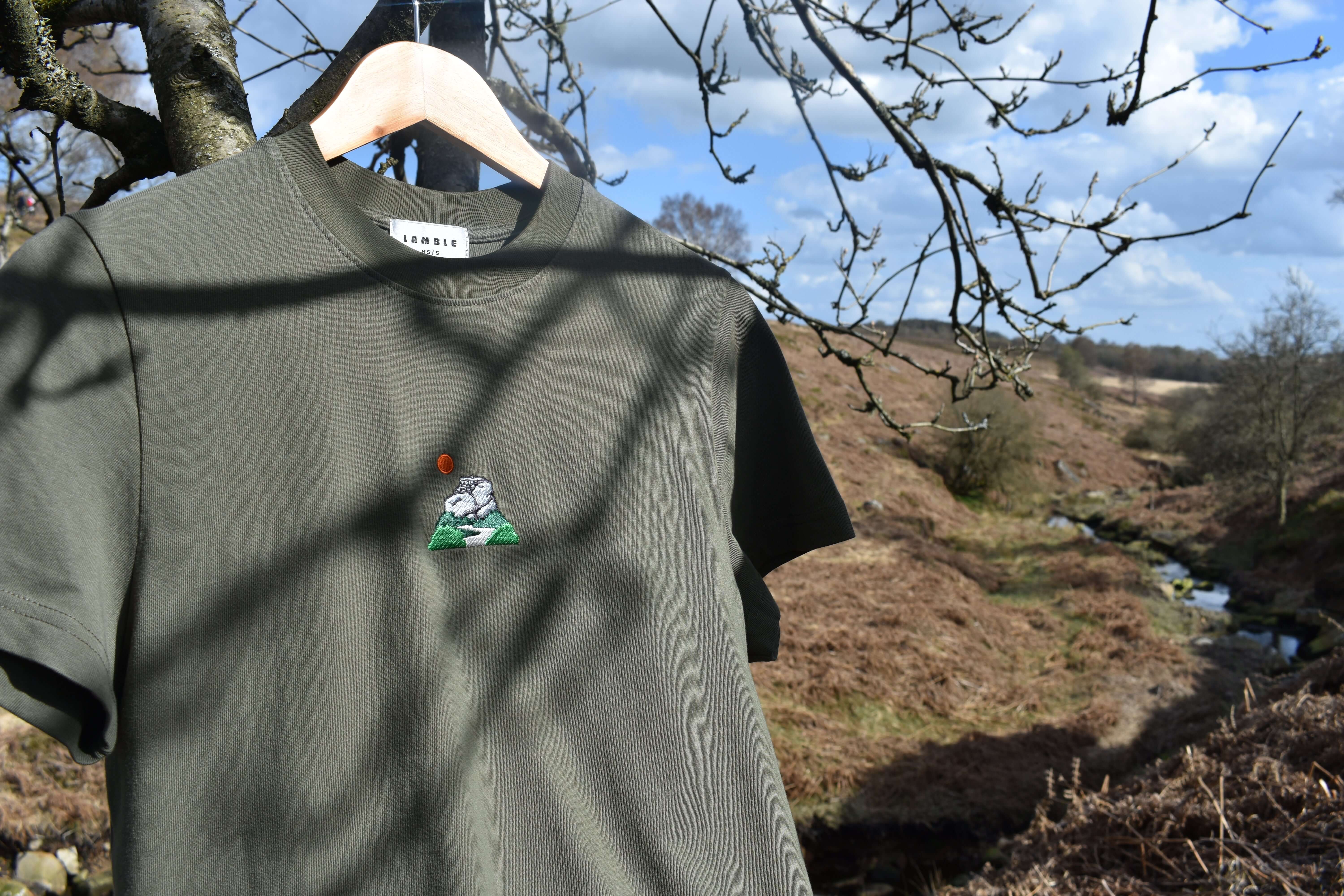 Lamble Peak District Edge T-shirt hanging on tree in moorland setting